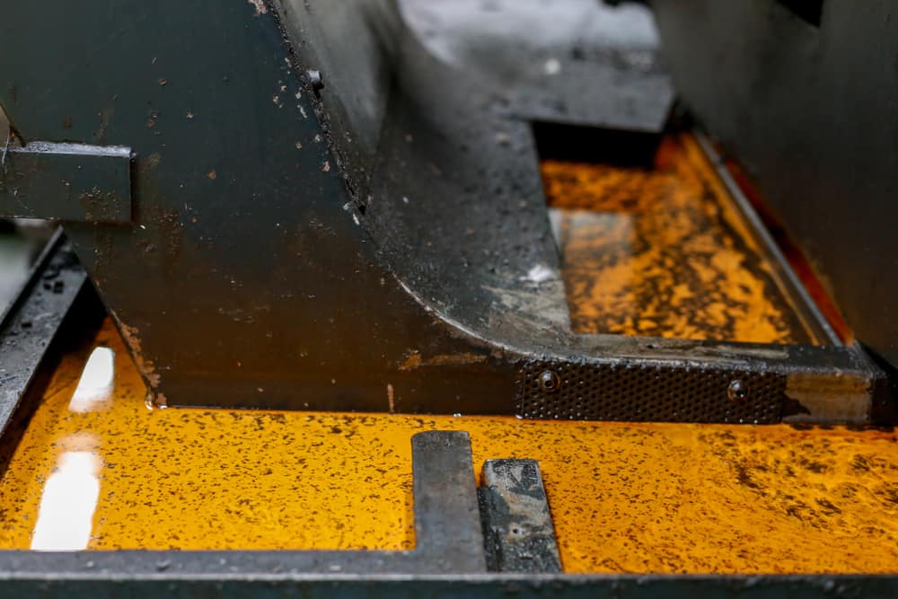 Image of dirty CNC tramp oil 